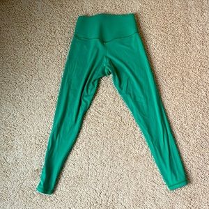 Women’s green leggings made by OFFLINE by Aerie.